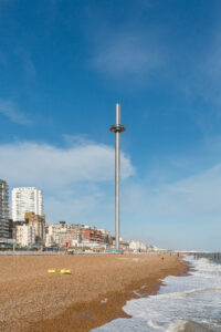 a tall tower on a beach