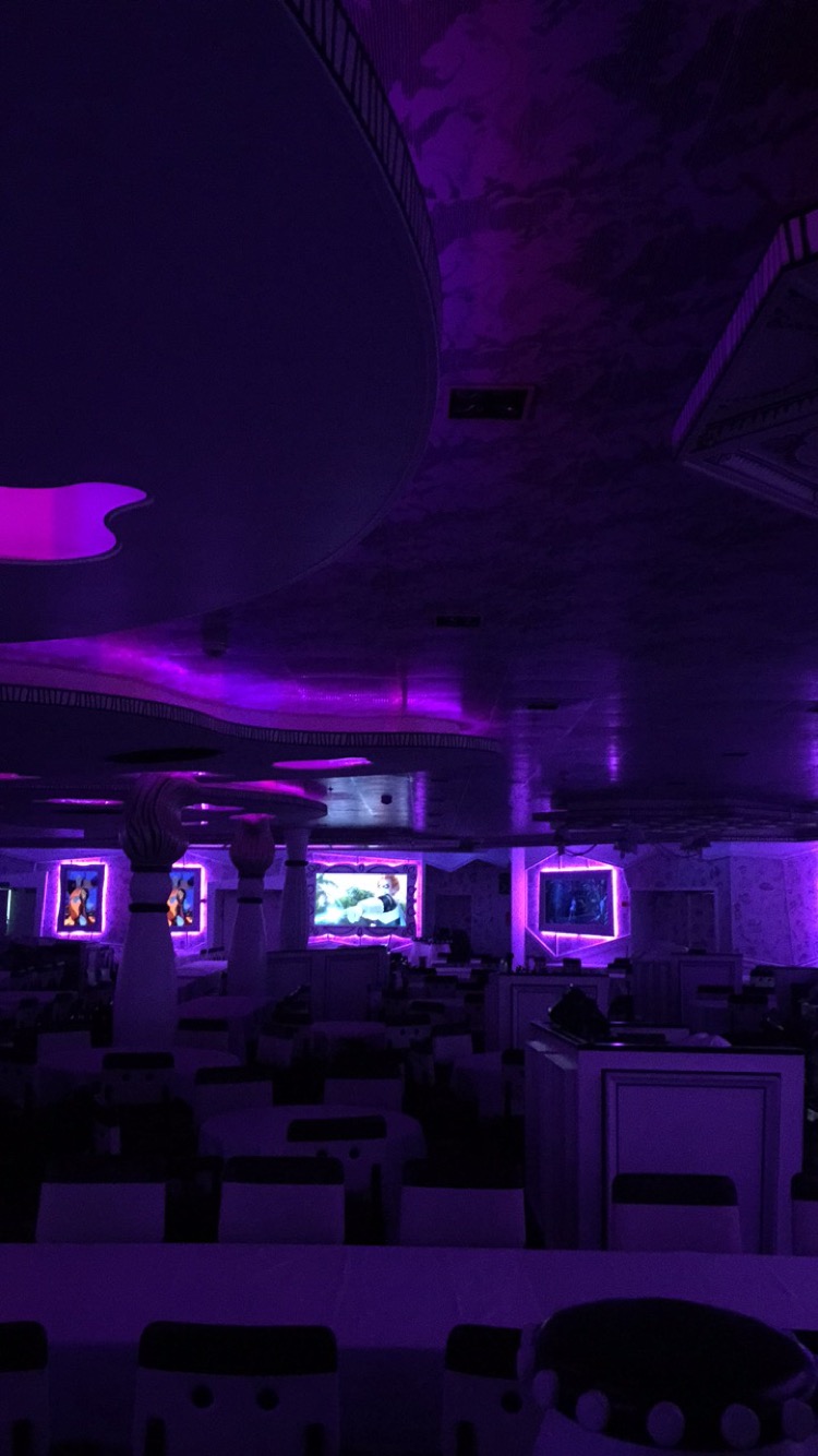 a room with purple lights