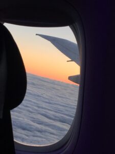a view of the wing of an airplane from an airplane window